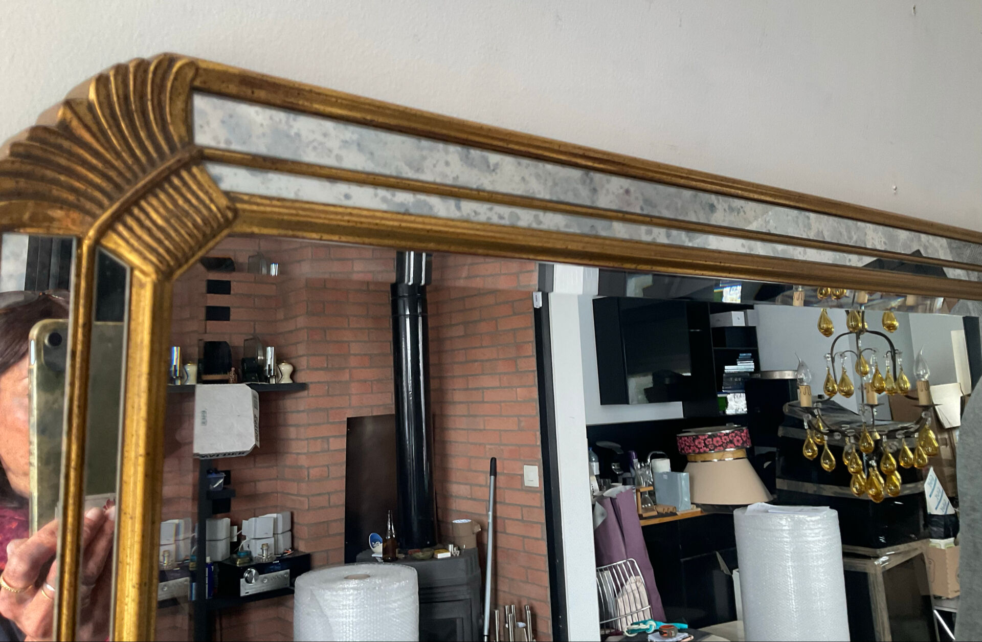 Large gold mirror by Deknudt with parcloses from the 1970s.