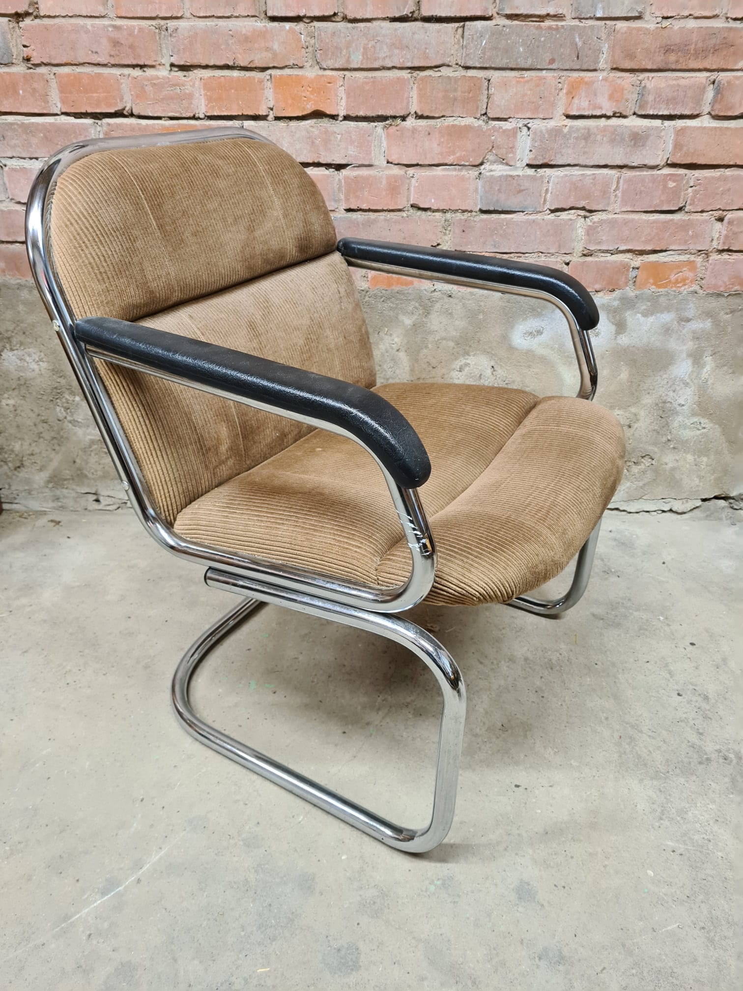 Vintage tubular ribbed office armchair
