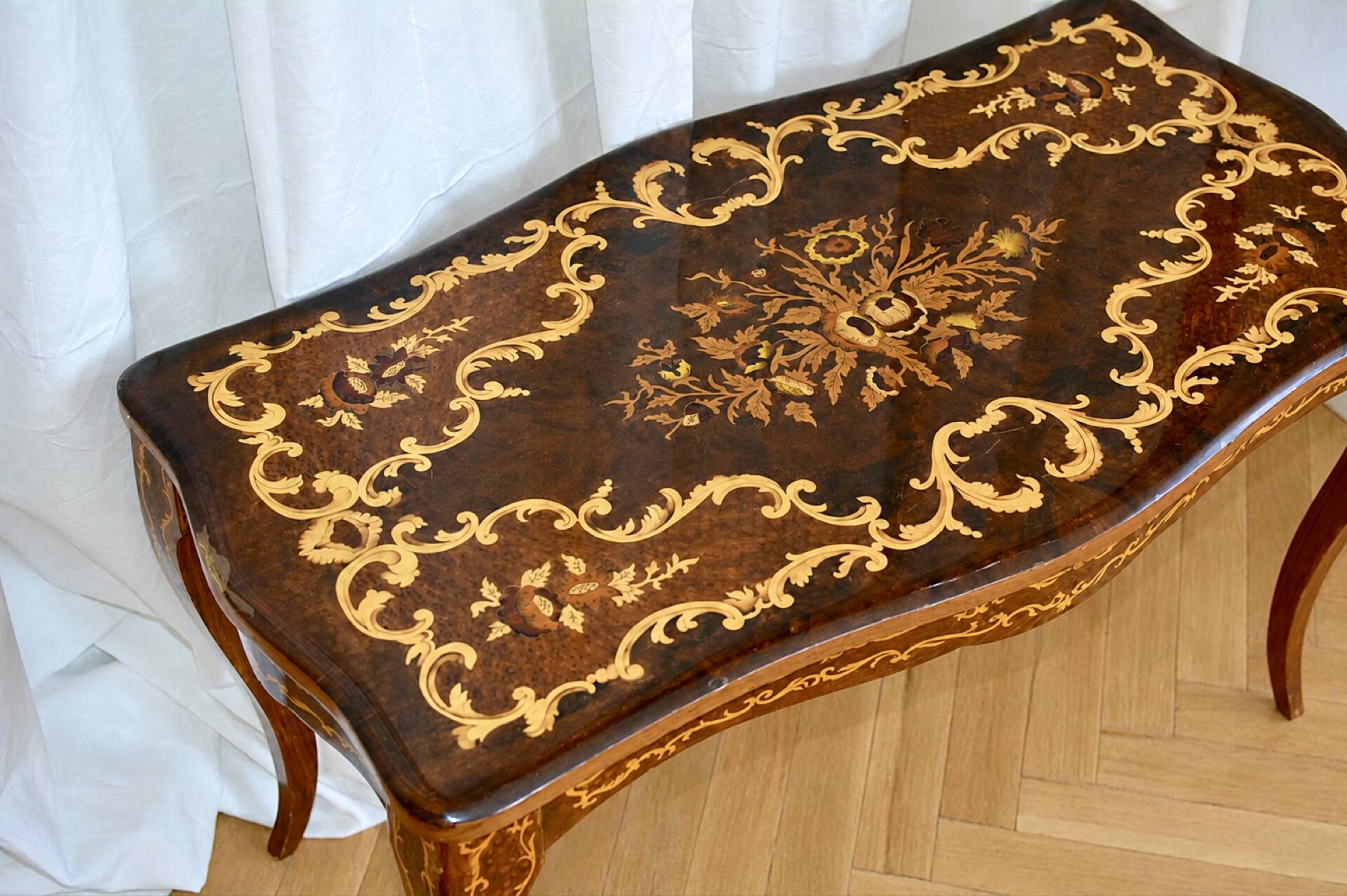 Antique coffee table with floral marquetry, Louis XV style.