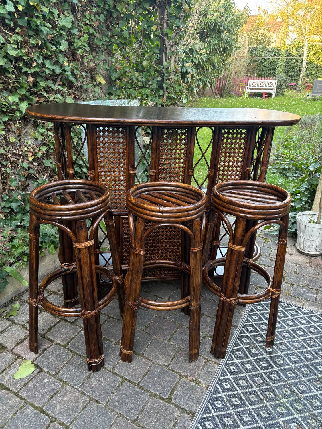 Rattan bar and vintage stools