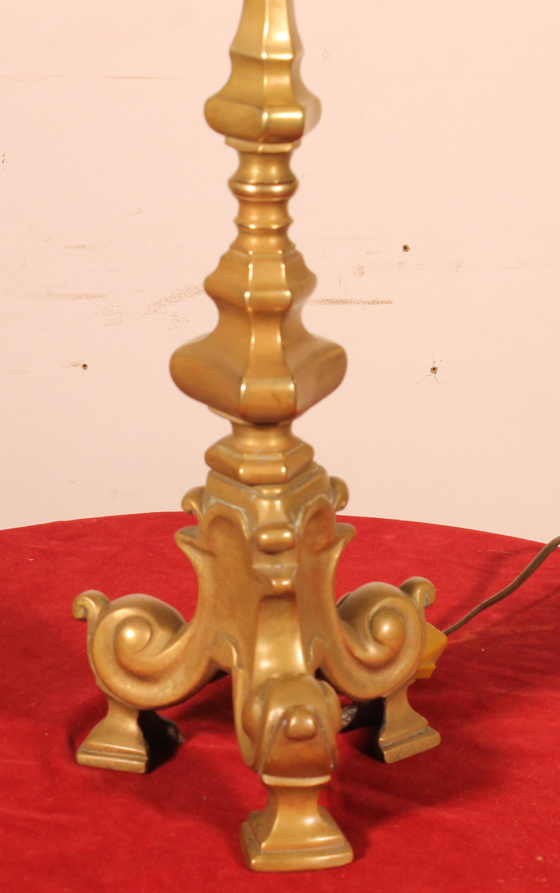 bronze candlestick from the 18th century converted into a lamp with its shade
