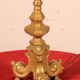 bronze candlestick from the 18th century converted into a lamp with its shade