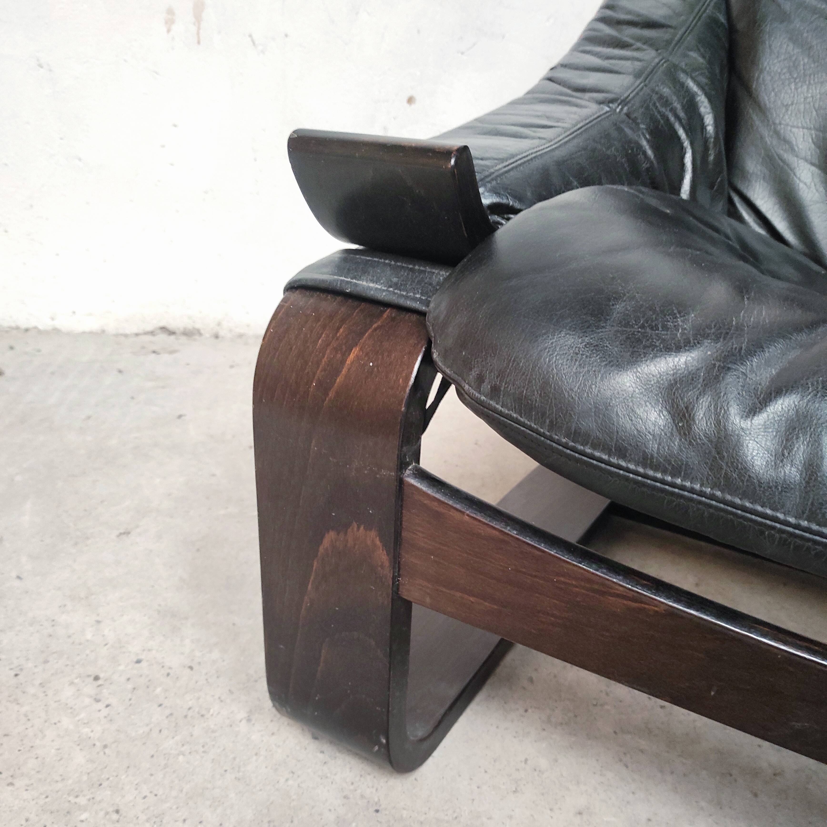 Pair of Kroken armchairs in black leather