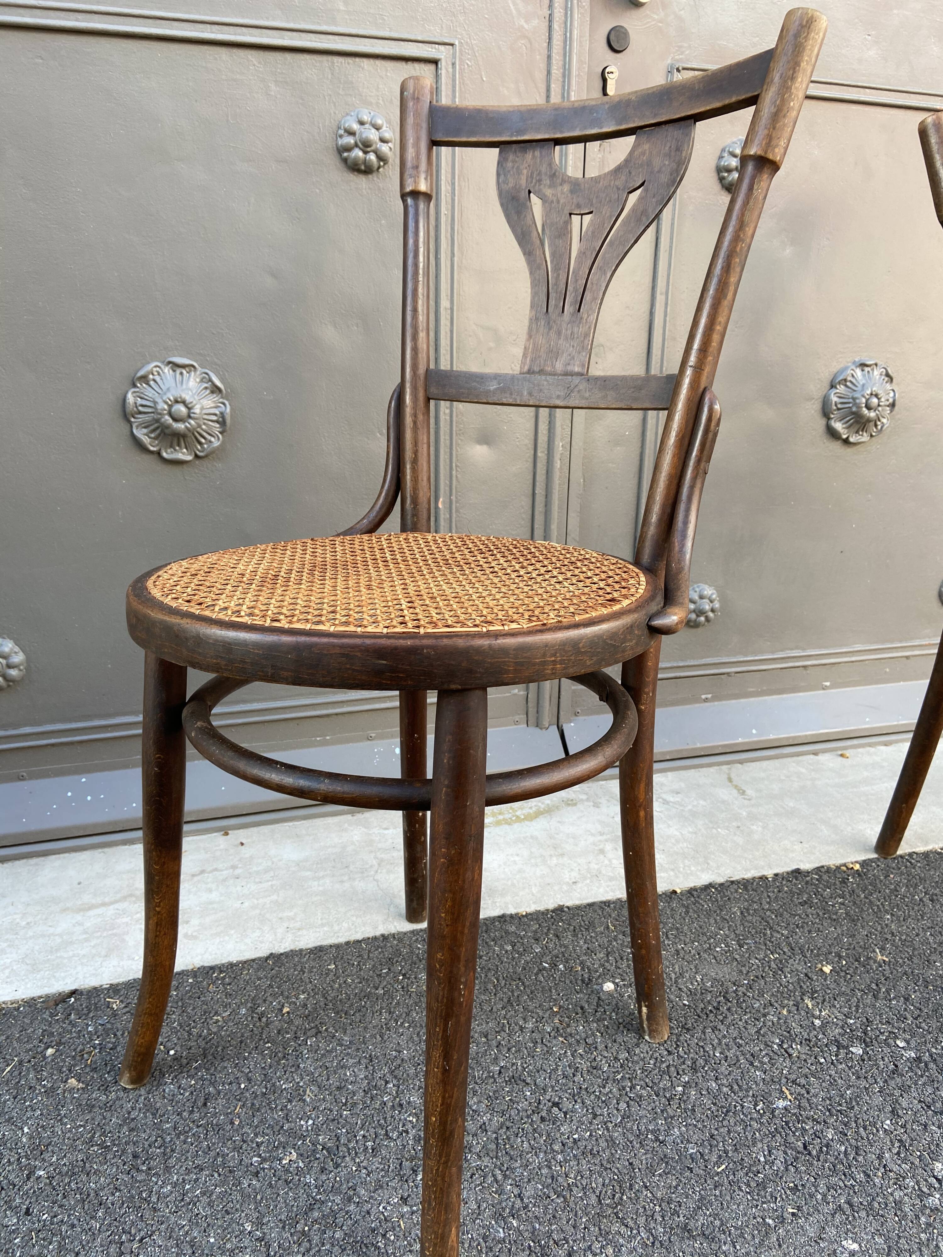 Pair of curved wooden bistro chairs