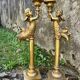 Pair of large candlesticks with cherubs