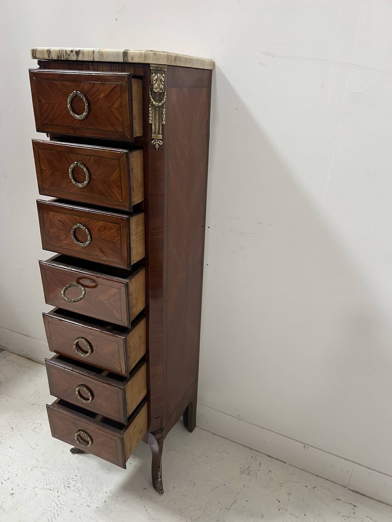 Semainier de style Transition en placage de bois, XXème siècle