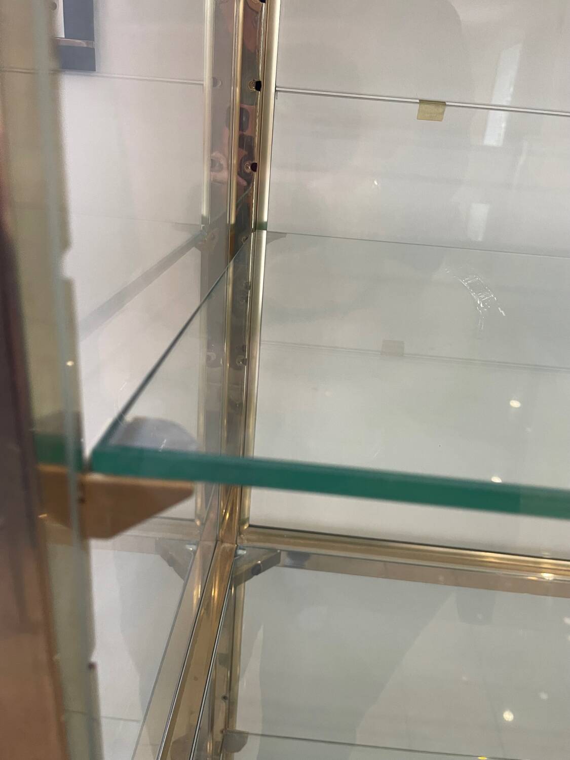 Large exhibition window in gilded brass 20th century period