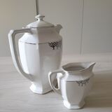 Old coffee maker and its milk pot