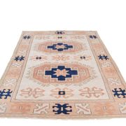 Tapis persan bleu marine et crème
