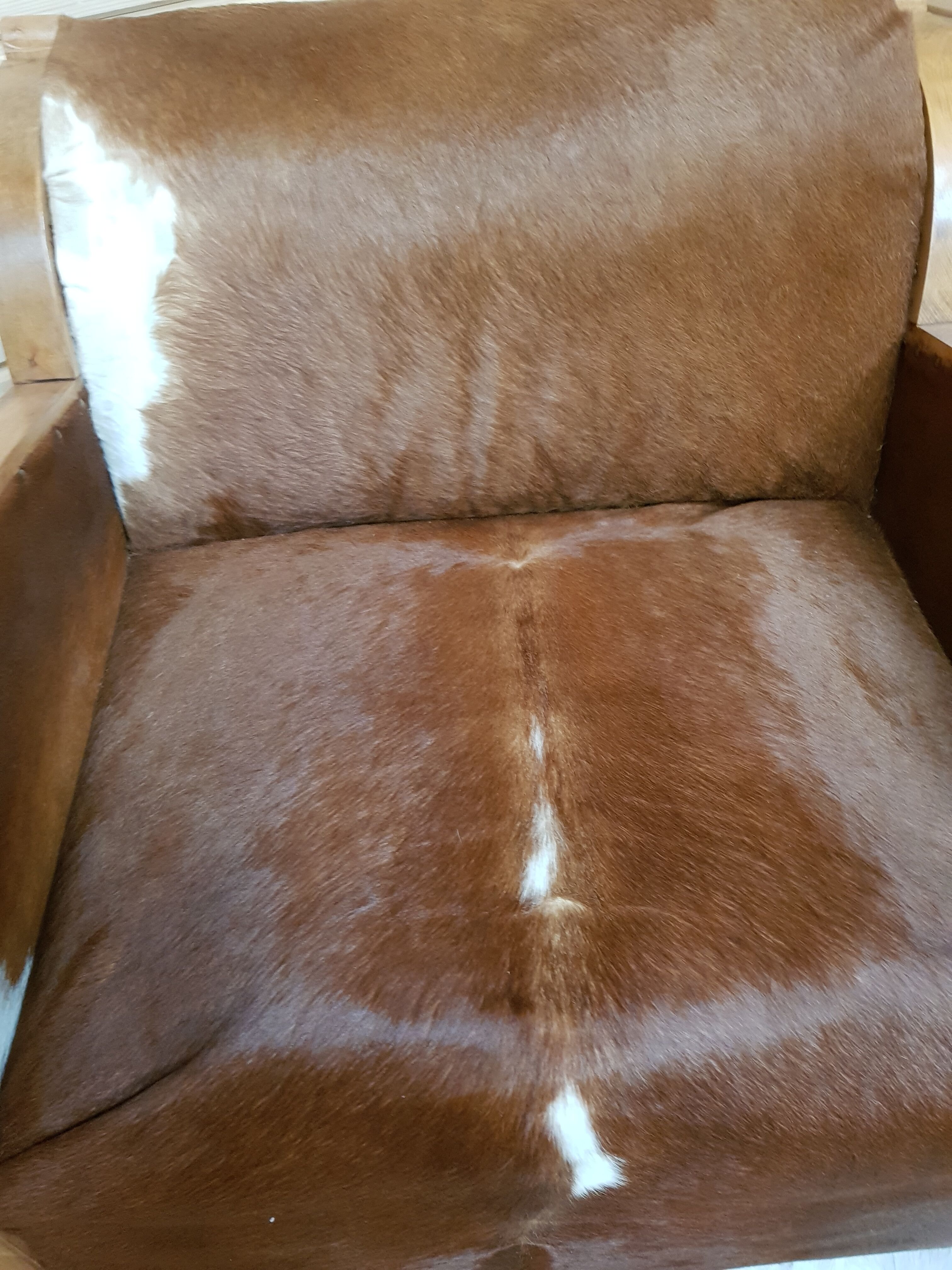 Ancient chair covered with cowskin