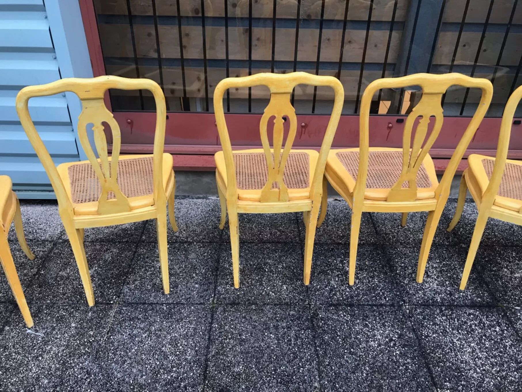 6 yellow canned chairs