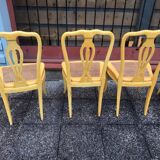 6 yellow canned chairs