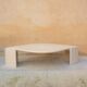 Table basse vintage en travertin par les éditions Roche Bobois