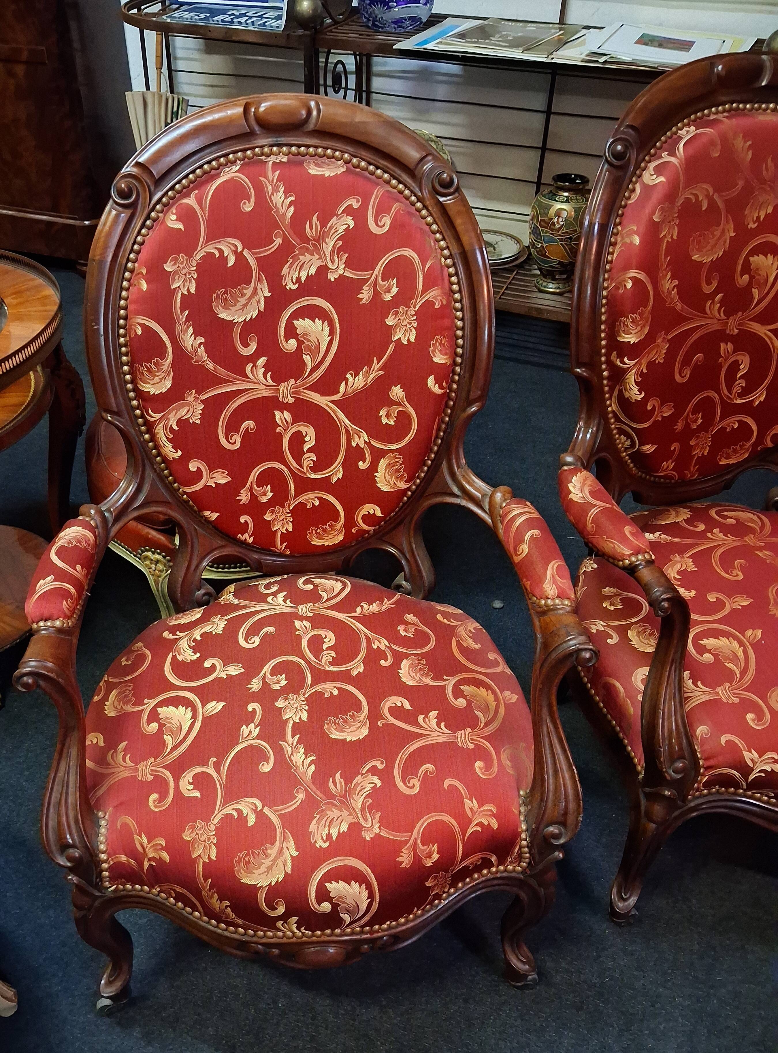 pair of mahogany armchairs, dating from the 19th century