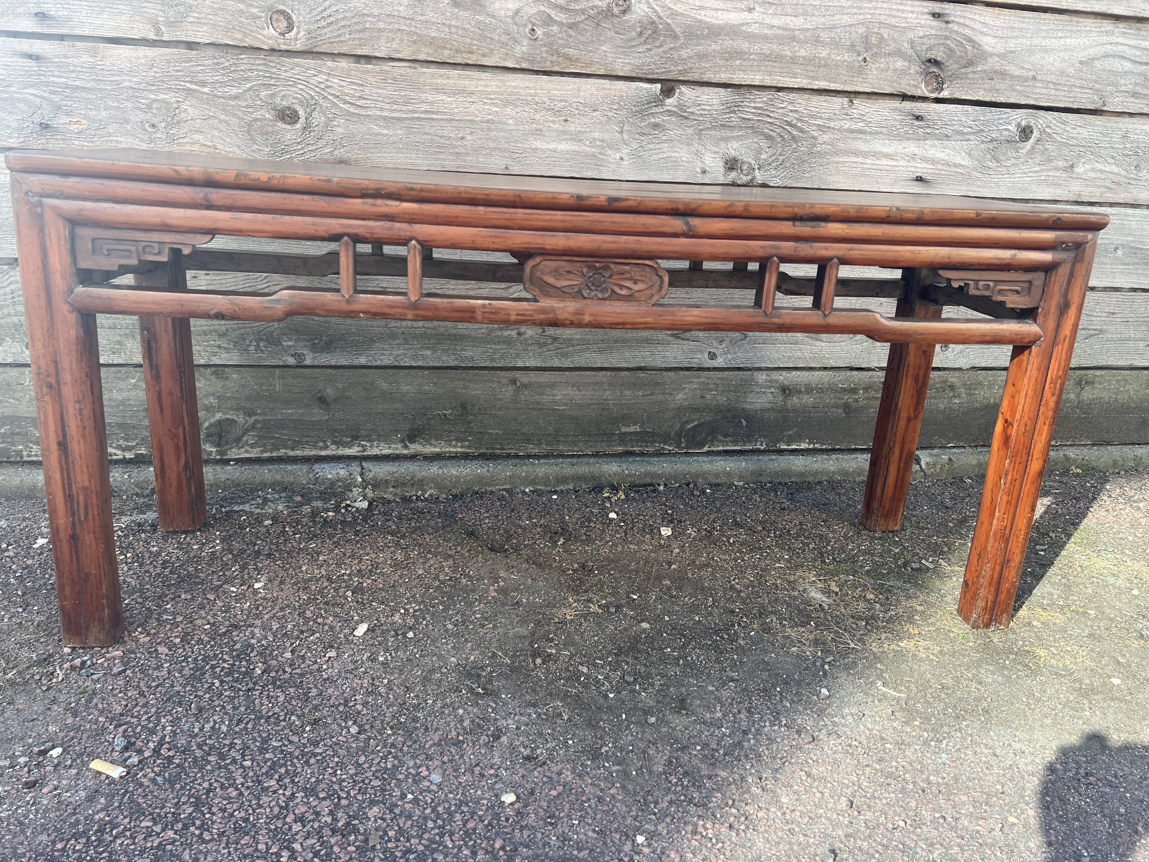 Asian low console in natural wood