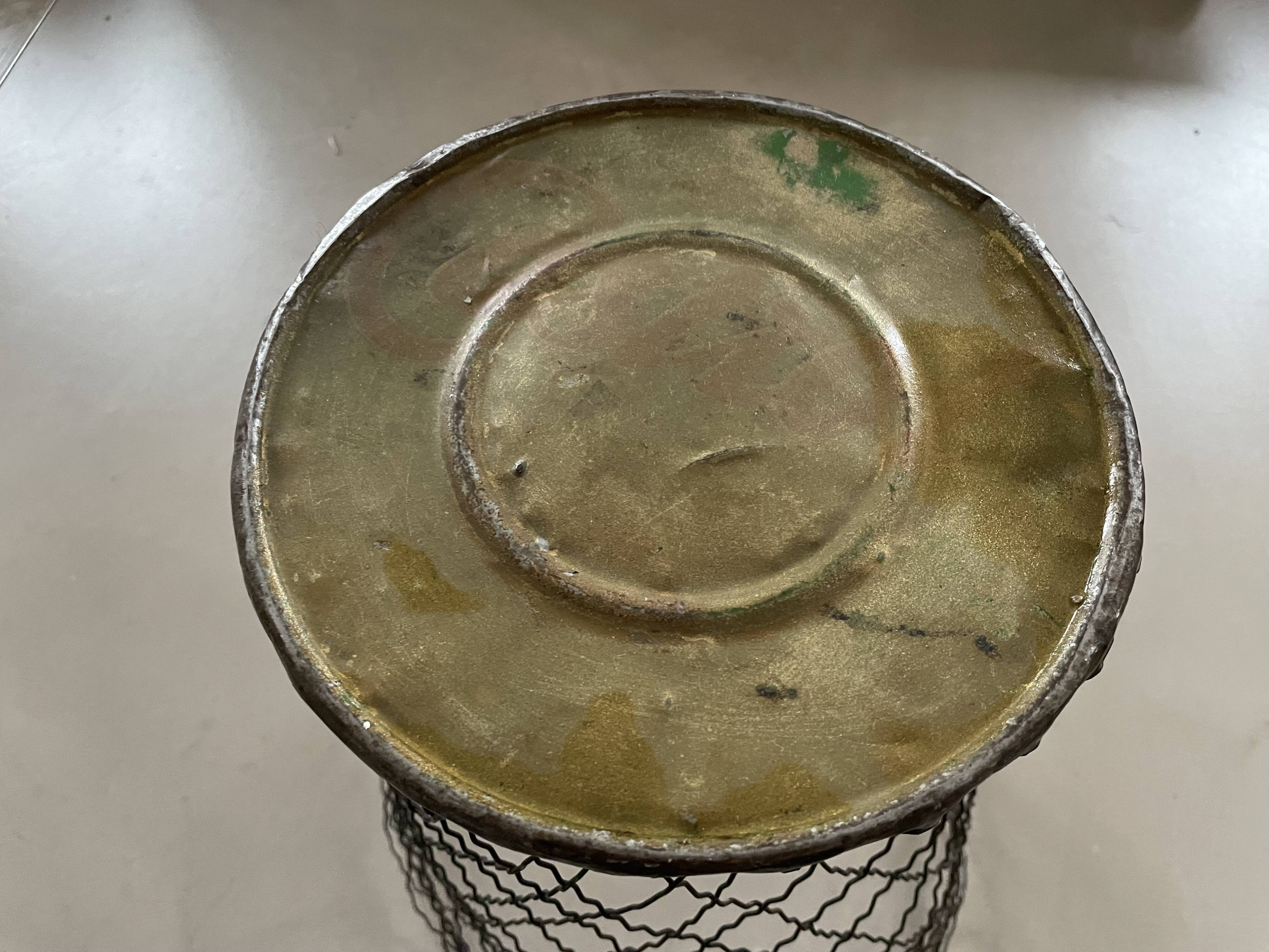 Old metal wastebasket