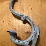 Enamelled cast iron coat hook