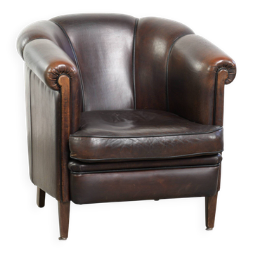 Dark sheepskin club armchair with unique design in English style