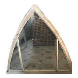 Metal mirror in the shape of an ogive