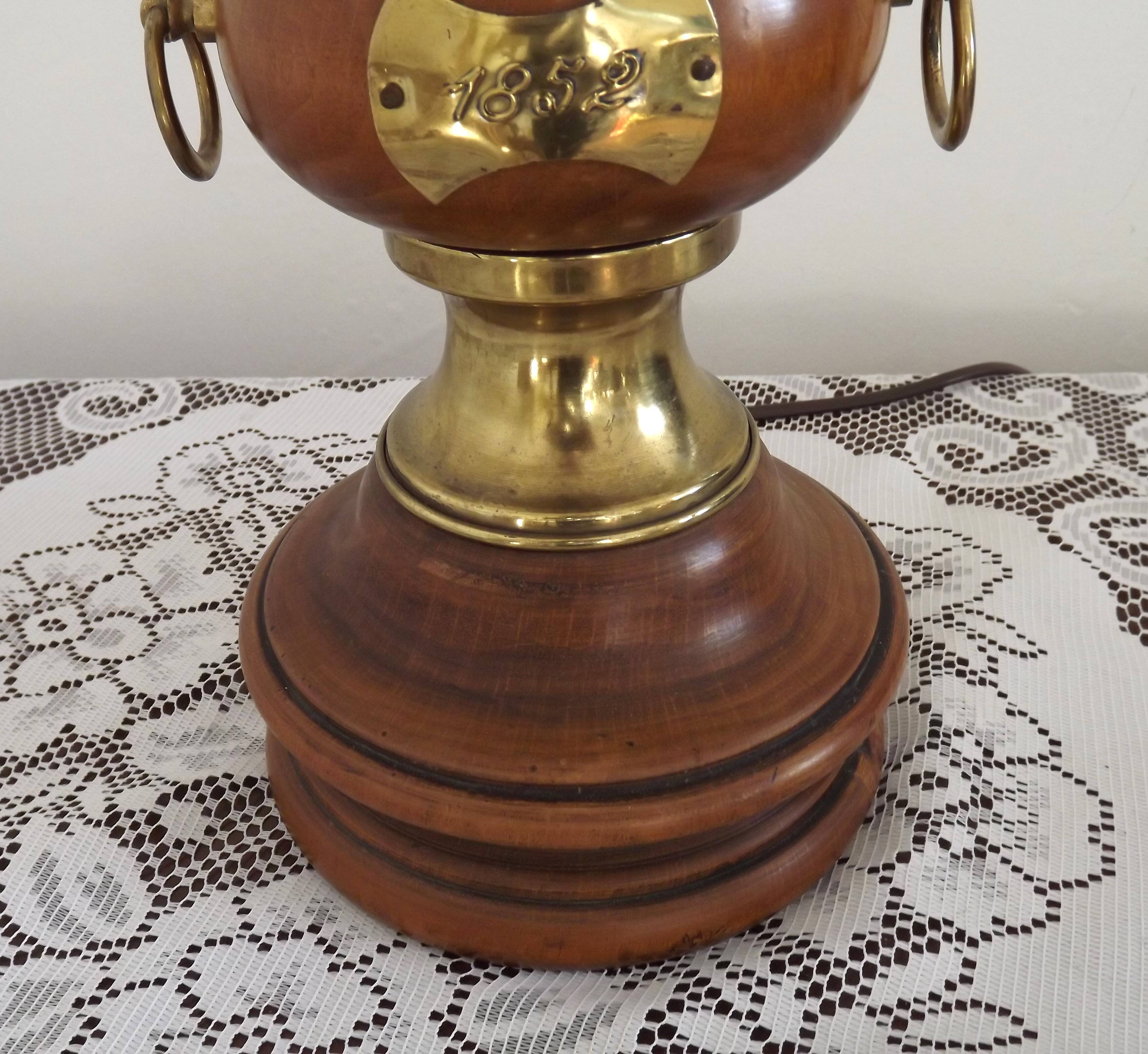 Turned wooden floor lamp with label and golden handles 1852