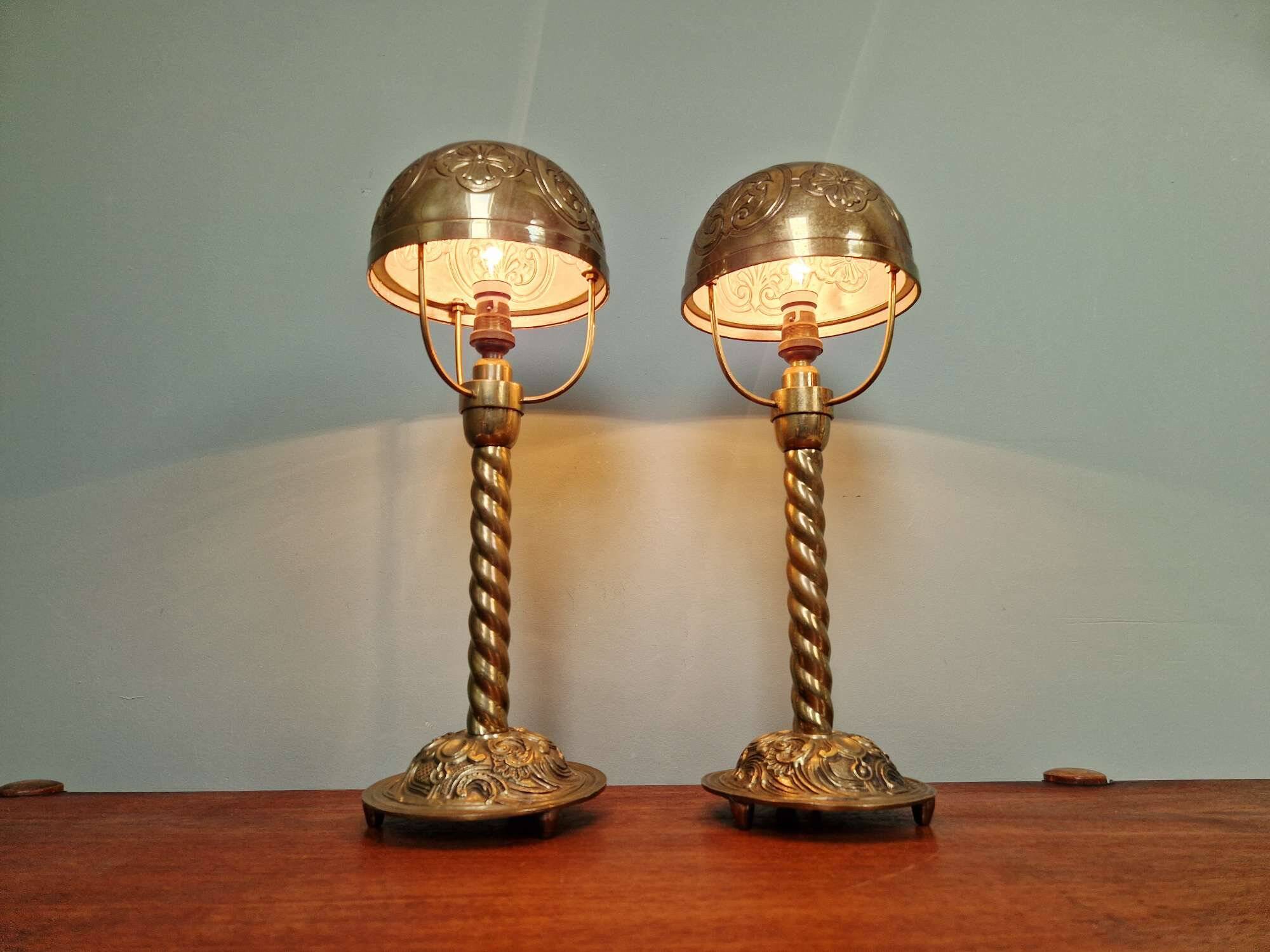 Pair of bronze and brass table lamps, early 20th century