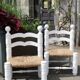 Pair of rush-seated chairs by Charles Dudouyt
