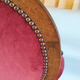 Red voltaire armchair
