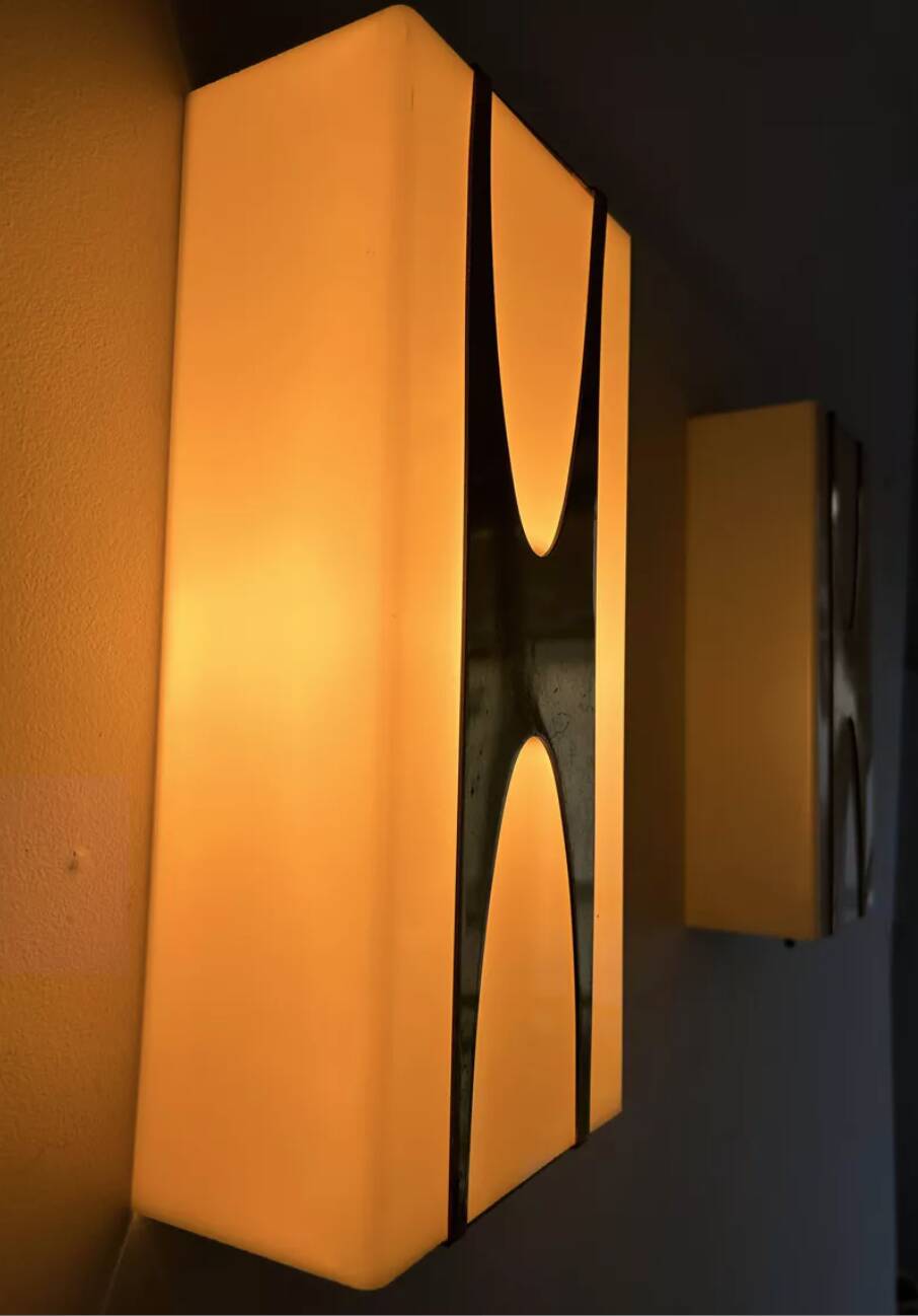 Pair of Loewy wall lights for Hilton, brass and Perspex, France 1965