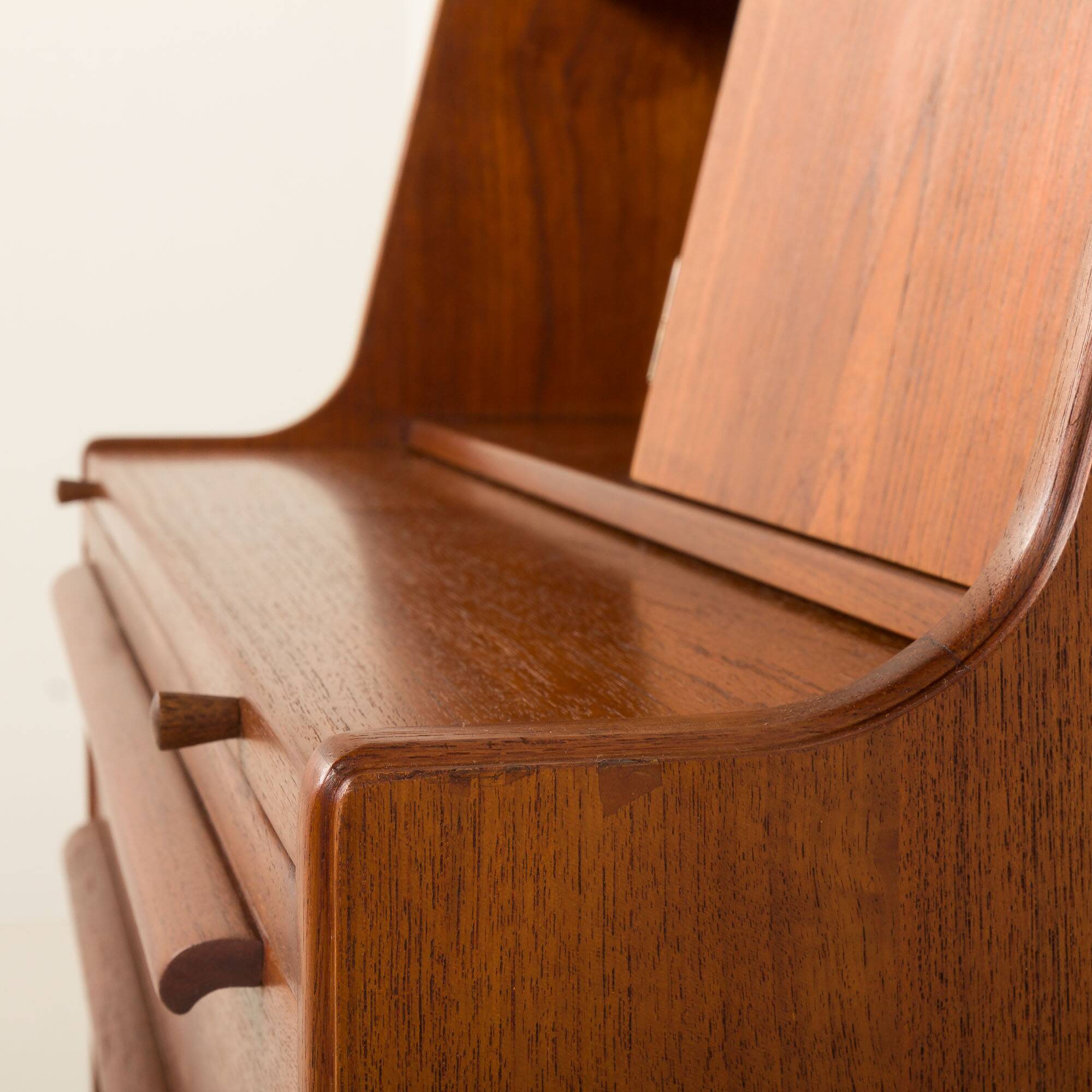 Danish  mid century teak  bureau with a hidden vanity by Ølholm Møbelfabrik