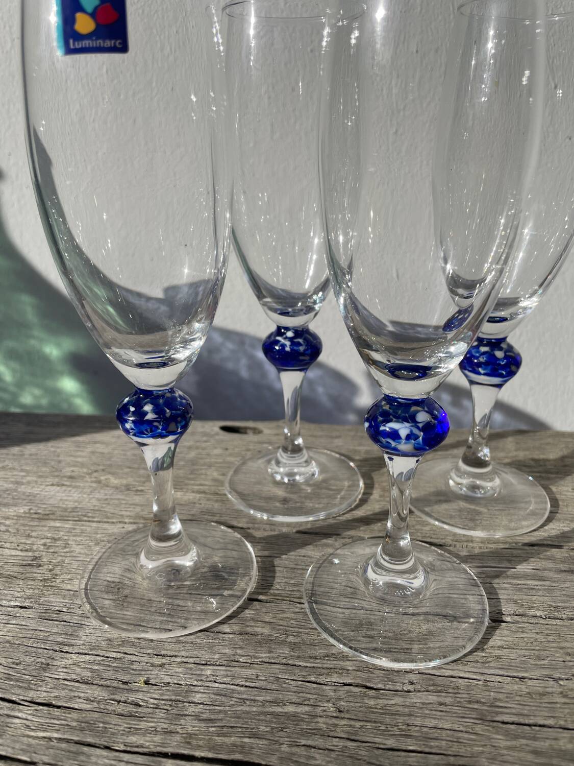 5 Luminarc blue glass flutes