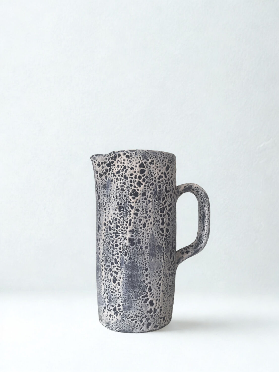 Speckled ceramic jug fat lava