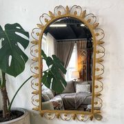 Vintage gold wall mirror with leaves