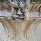 Pair of planter vases decorated with faces in reconstituted stone 1950s