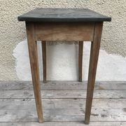 Old kitchen table in wood with compass feet