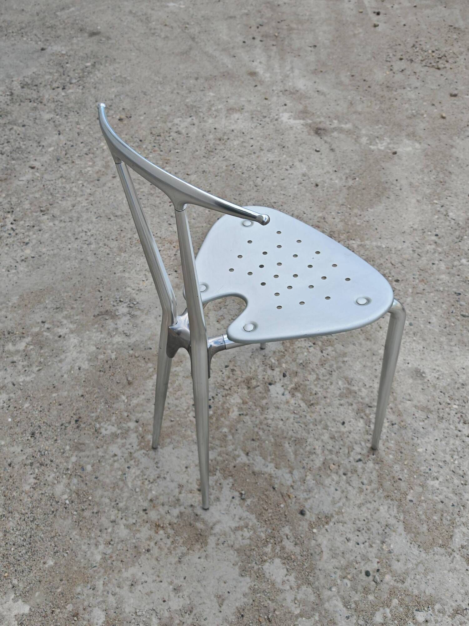 Postmodern pair of "Hole" accent chairs by Carlo Bartoli for Ycami 1993.