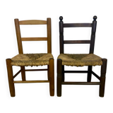 Pair of old wooden and straw children's chairs.