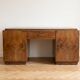 Large Art Deco desk in solid wood with storage cabinets.