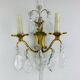Bronze wall light with rococo style Louis XV pendants.
