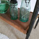 Serving table on metal wheels and antique wood