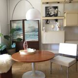 Dining table with a modular tulip foot