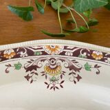 Antique serving dish in Longchamp earthenware.