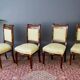 Ensemble de salon en noyer, bronze et marbre de style Empire français avec table et chaises.