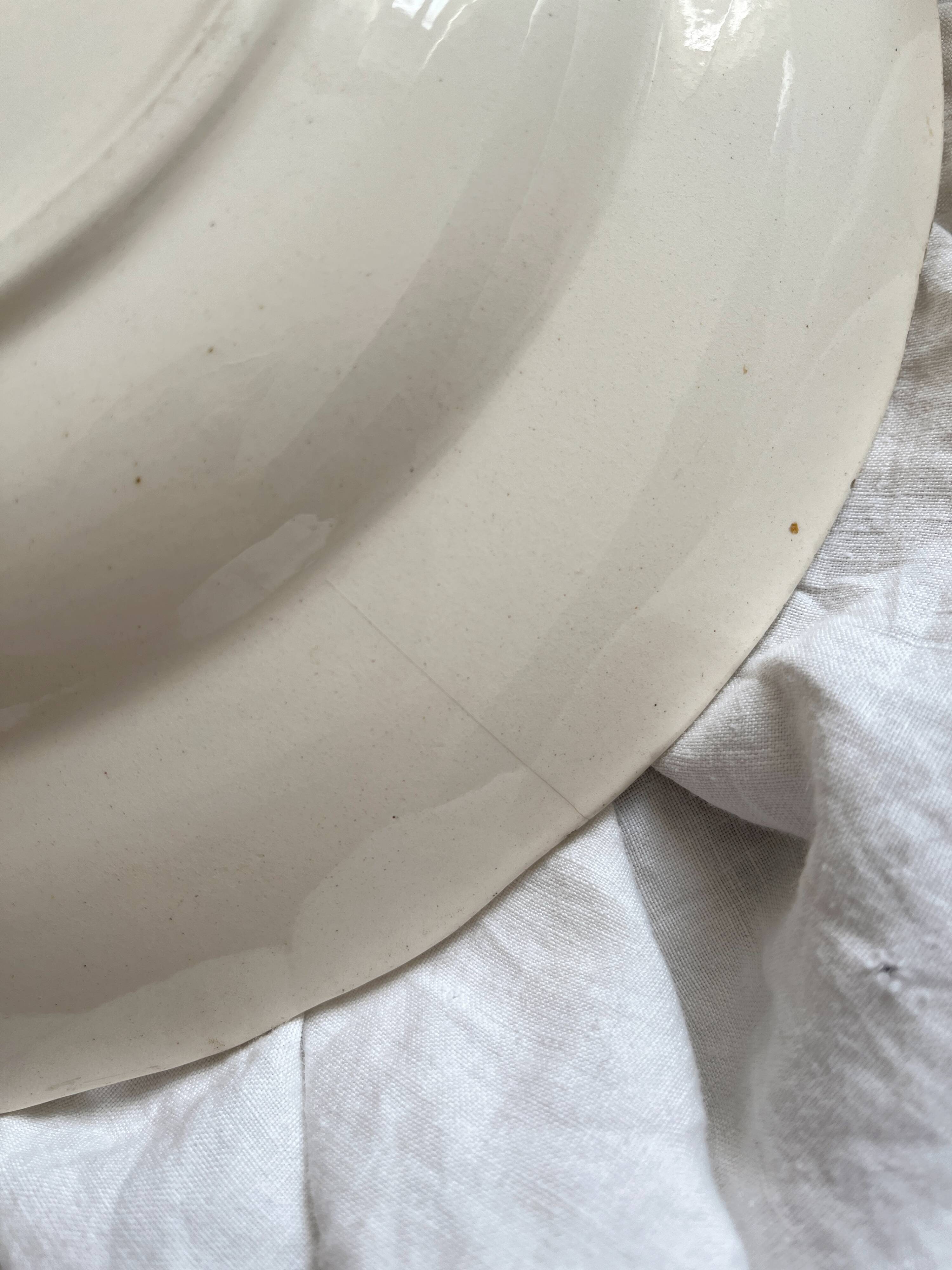 Round iron clay dish "Aster" Longchamp