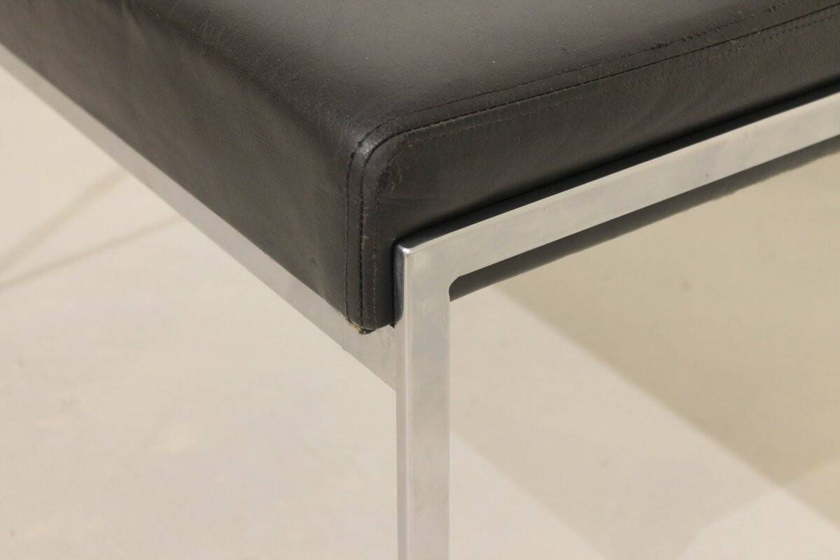 Pair of designer leather and brushed stainless steel footrests - Rob Parry