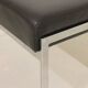 Pair of designer leather and brushed stainless steel footrests - Rob Parry
