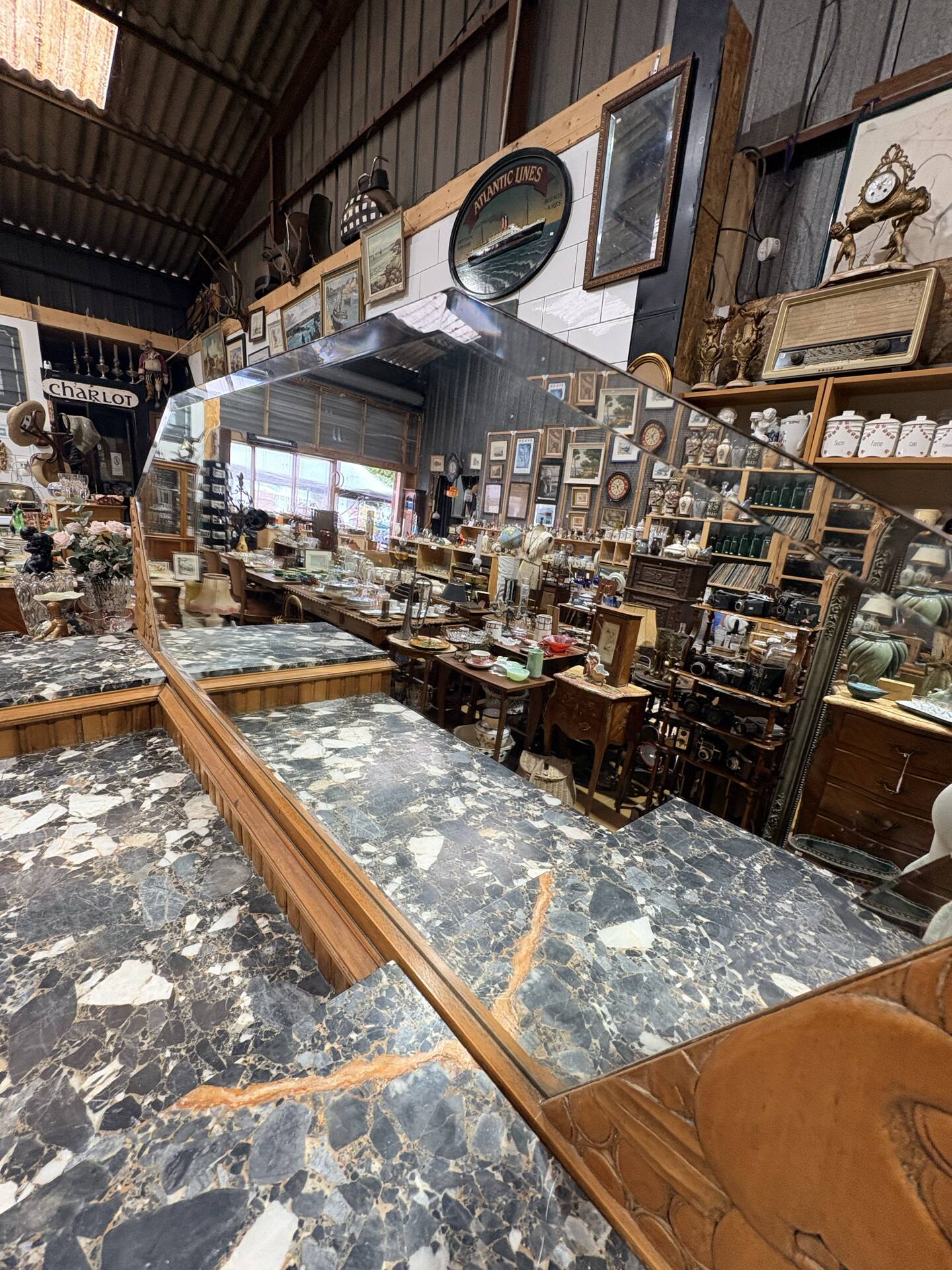 Art Deco buffet in carved walnut, marble and large mirror – 1930s