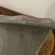 Small footrest bench in solid wood with a slate grey patina.