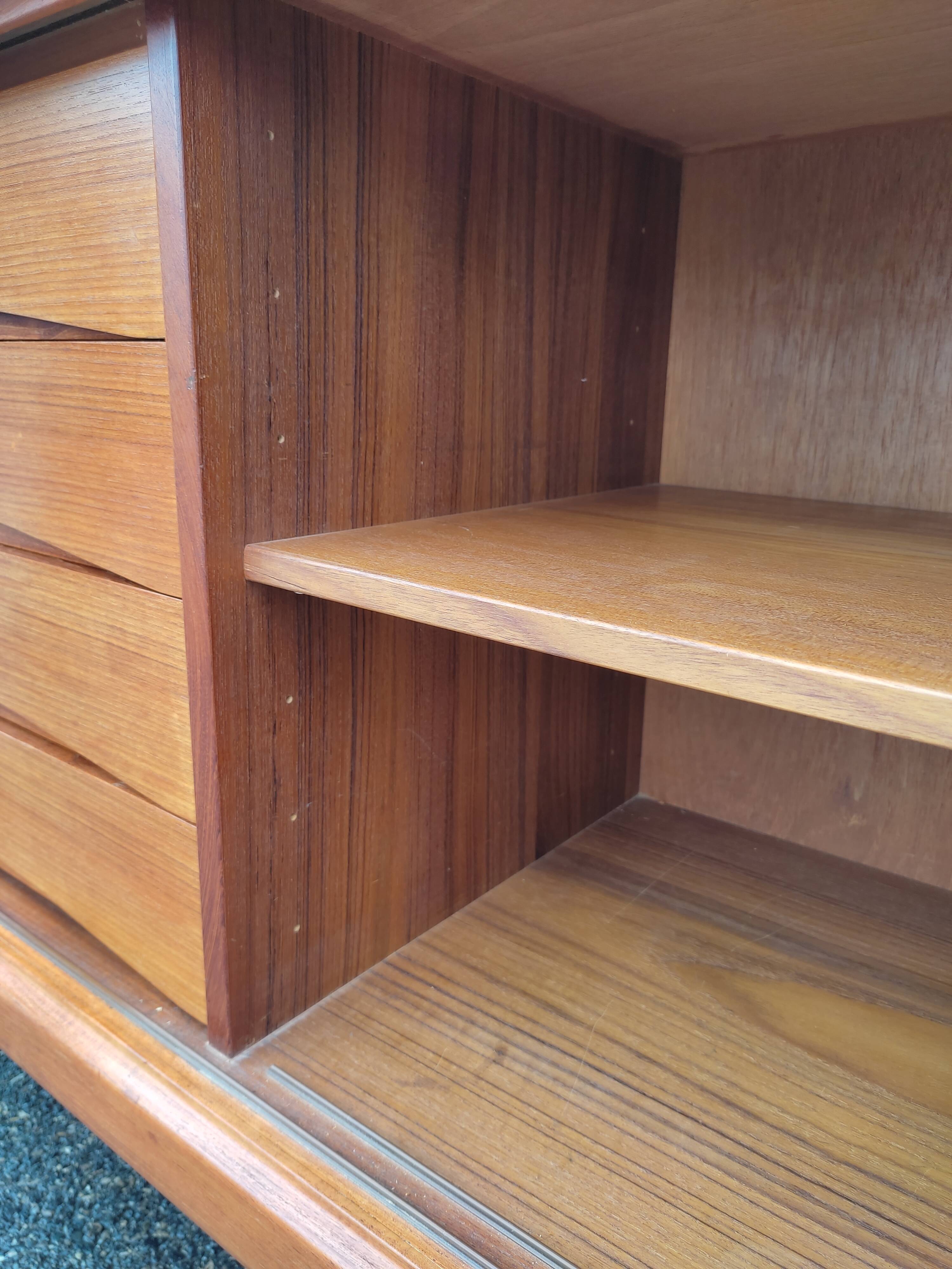 Scandinavian teak row by Axel Christensen for ACO Mobler