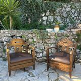 Pair of armchairs in stained wood and leather, 20th century