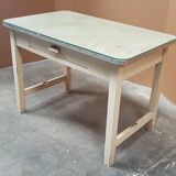 Old desk table with glass plate and drawer